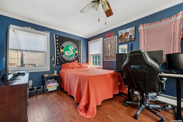 bedroom featuring ceiling fan, crown molding, and dark hardwood / wood-style floors