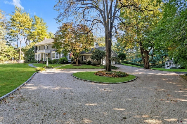 view of front of home featuring a front lawn