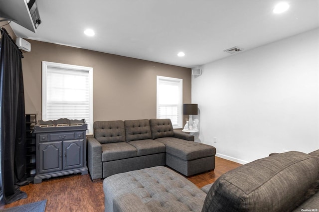 living room featuring dark hardwood / wood-style floors