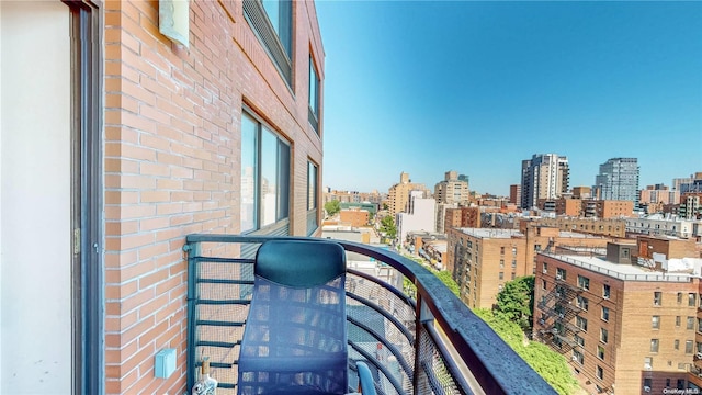 balcony featuring a view of city