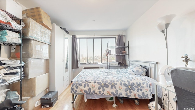 bedroom featuring light hardwood / wood-style floors