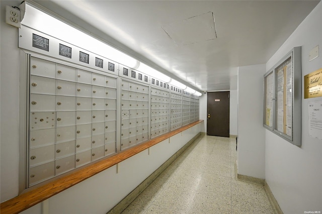 corridor featuring mail boxes