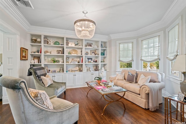 living area featuring a chandelier, dark hardwood / wood-style flooring, and ornamental molding