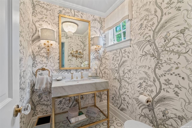 bathroom with vanity and crown molding