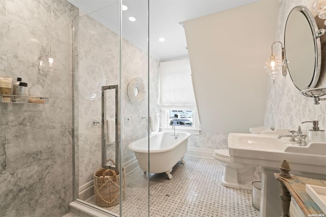 bathroom featuring toilet, tile patterned floors, a bathtub, and crown molding