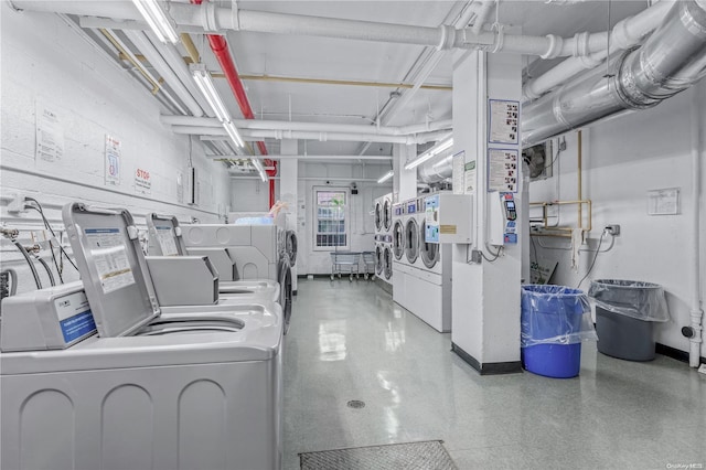 laundry room featuring washing machine and dryer