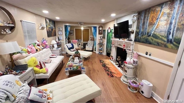 recreation room with hardwood / wood-style flooring