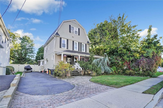 view of property featuring a front yard