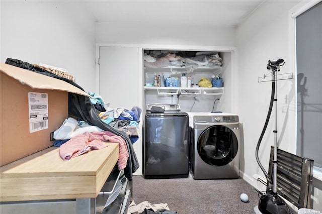 clothes washing area with carpet and separate washer and dryer