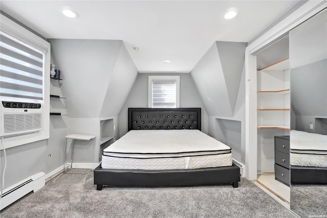 bedroom with lofted ceiling, cooling unit, carpet floors, and baseboard heating