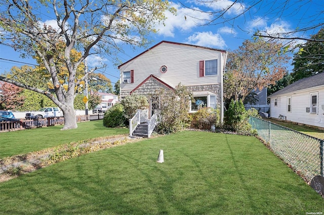 view of property with a front lawn