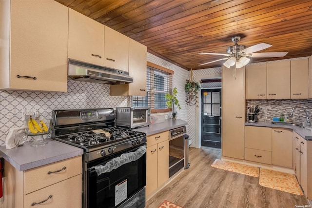 kitchen featuring light wood-type flooring, gas stove, wood ceiling, and backsplash