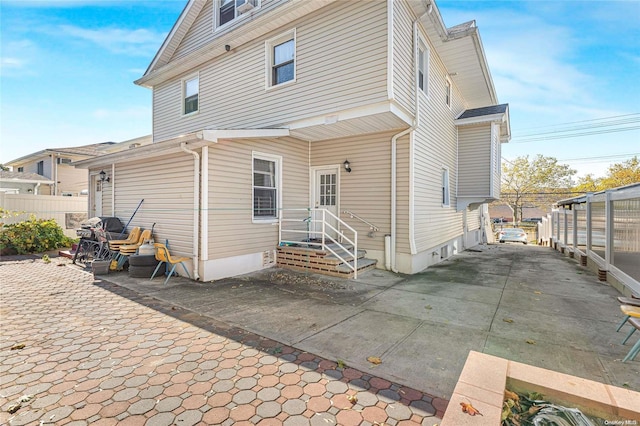 rear view of property with a patio