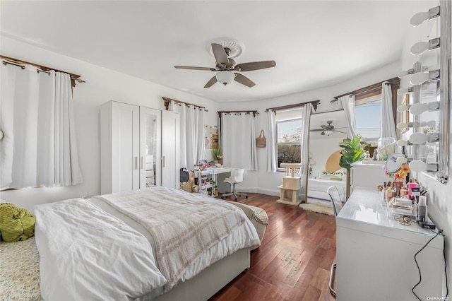 bedroom featuring dark hardwood / wood-style floors and ceiling fan