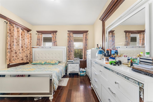 bedroom featuring dark hardwood / wood-style floors