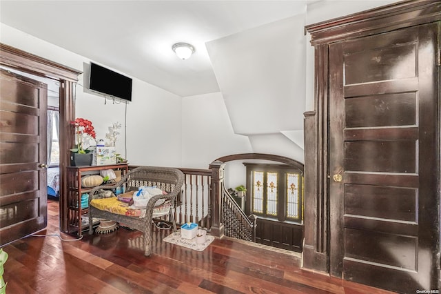 foyer with dark hardwood / wood-style flooring