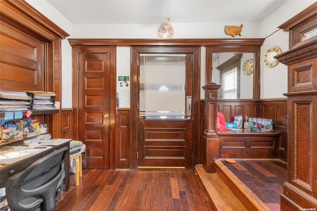 interior space with dark hardwood / wood-style flooring