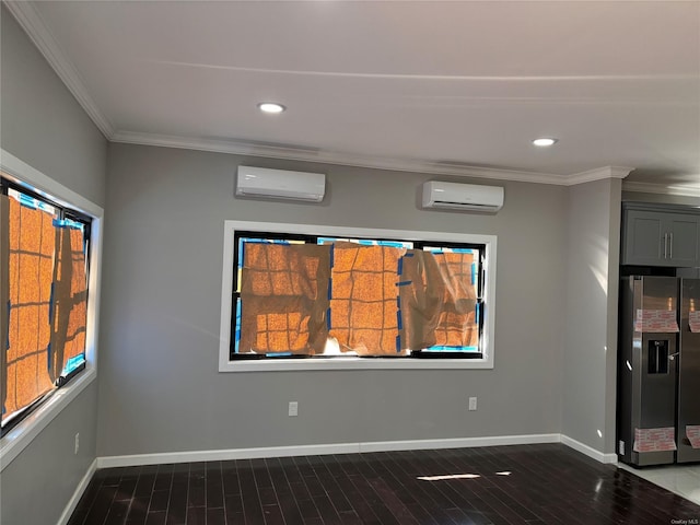 empty room with a wall unit AC, crown molding, and dark wood-type flooring