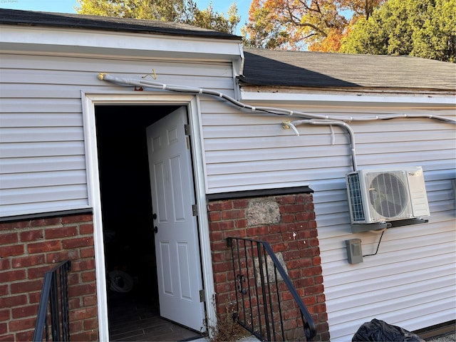 property entrance featuring ac unit