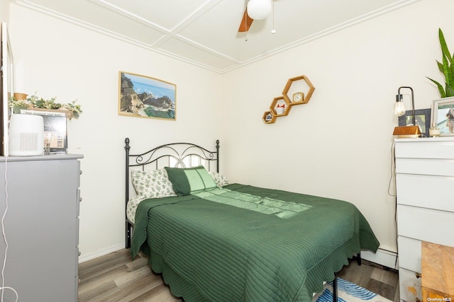 bedroom featuring ceiling fan and light hardwood / wood-style flooring