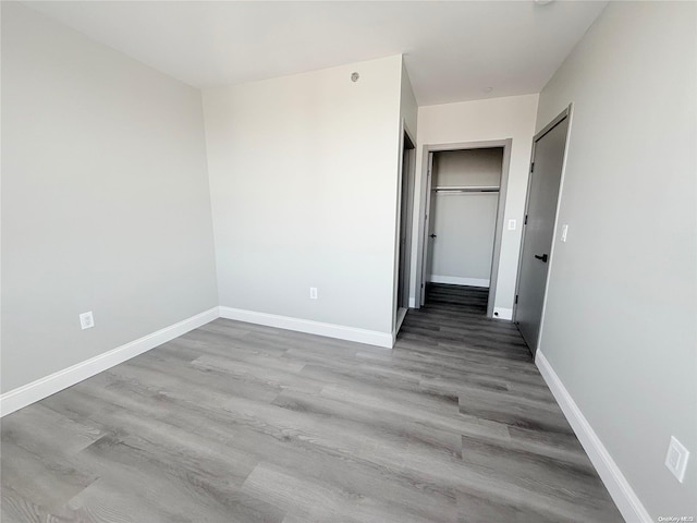 unfurnished bedroom featuring light hardwood / wood-style floors