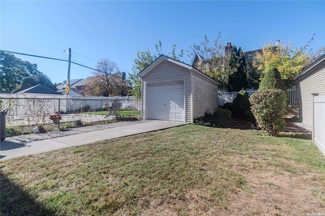 garage with a yard