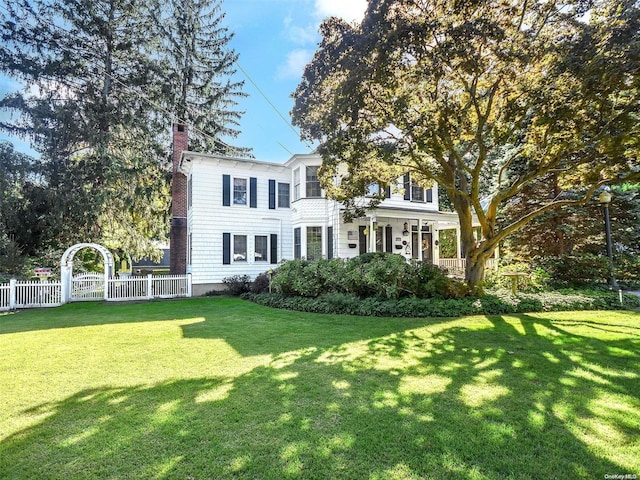 view of front of home with a front yard