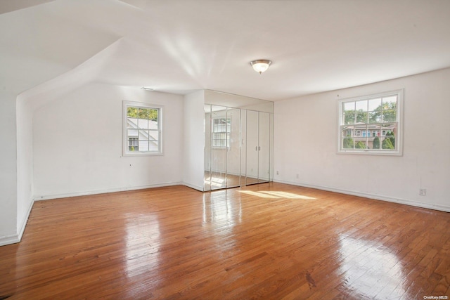 spare room featuring light hardwood / wood-style flooring