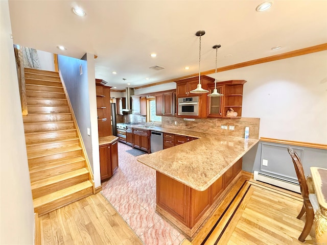 kitchen featuring open shelves, hanging light fixtures, appliances with stainless steel finishes, a baseboard heating unit, and a peninsula