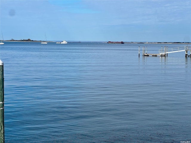 property view of water featuring a dock