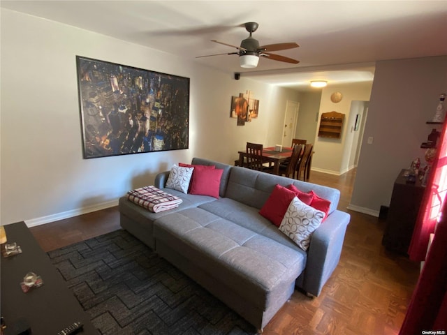 living room featuring ceiling fan