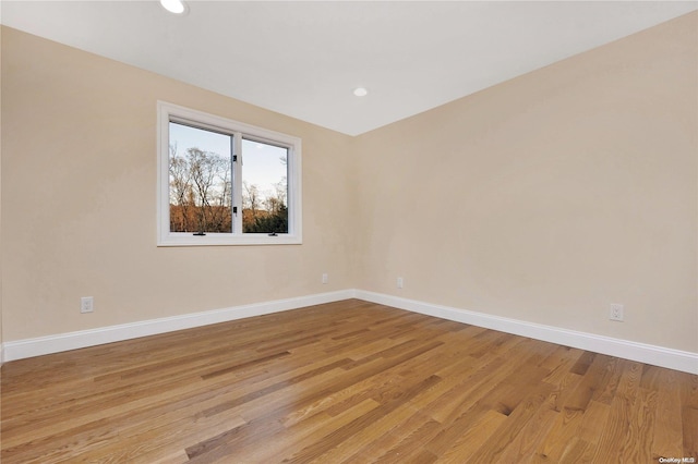 unfurnished room featuring light wood-type flooring