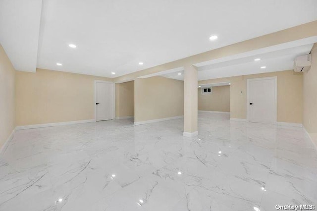 basement featuring an AC wall unit