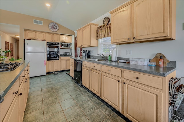 kitchen with sink, black appliances, lofted ceiling, and light brown cabinets