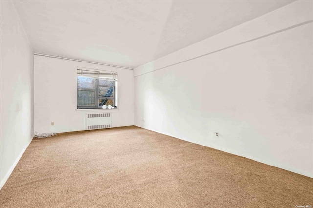 25-18 Union St Unit 3A, Flushing, NY 11354 - carpeted spare room featuring radiator