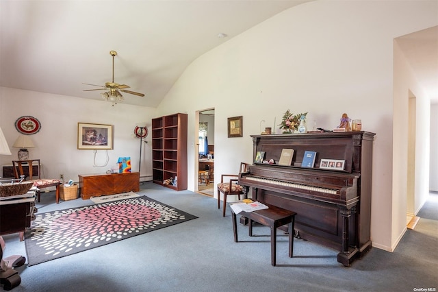 miscellaneous room featuring carpet flooring, ceiling fan, a baseboard heating unit, and vaulted ceiling