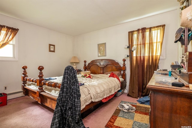 bedroom featuring carpet and baseboard heating