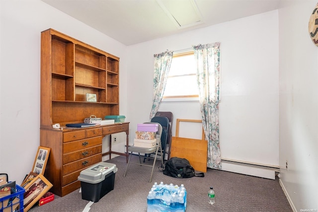 office with dark colored carpet and baseboard heating