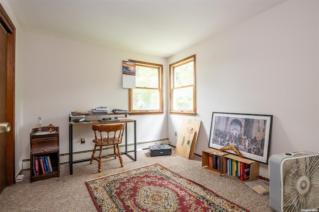 carpeted home office with a baseboard heating unit