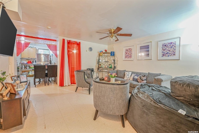 living room featuring ceiling fan