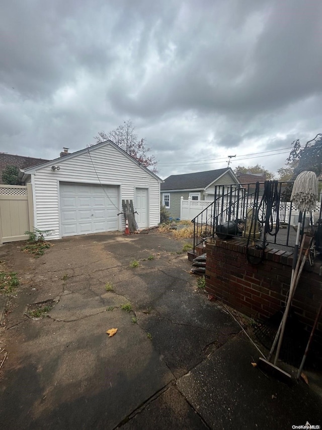 view of home's exterior with an outbuilding and a garage