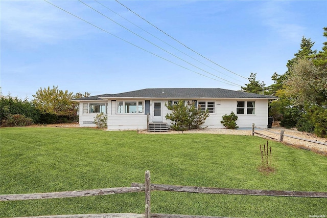 21 E Shore Dr, Southampton, NY 11968 - ranch-style home featuring a front lawn