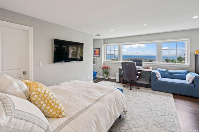 bedroom featuring hardwood / wood-style flooring