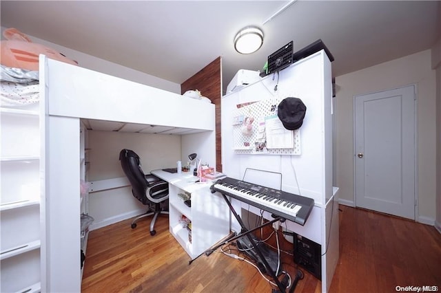 bedroom featuring dark wood-type flooring