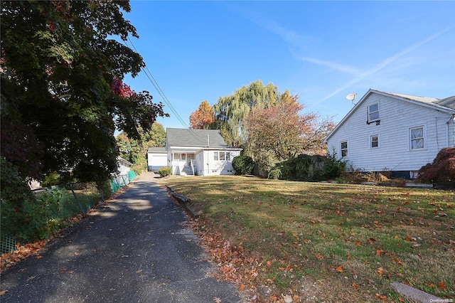 view of front of house with a front lawn