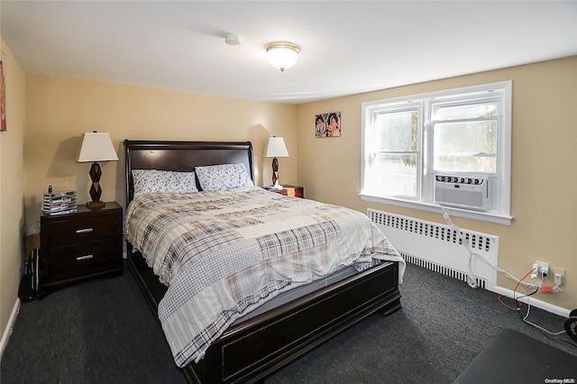 carpeted bedroom featuring radiator and cooling unit