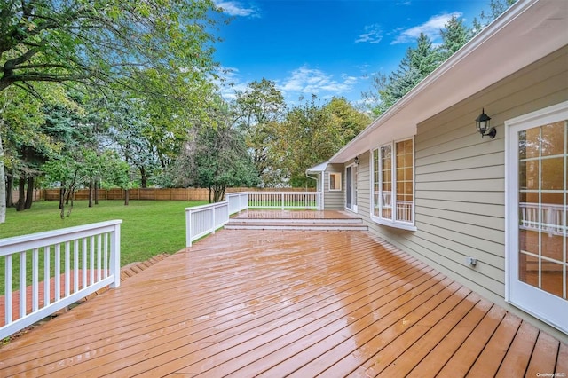 deck featuring a lawn