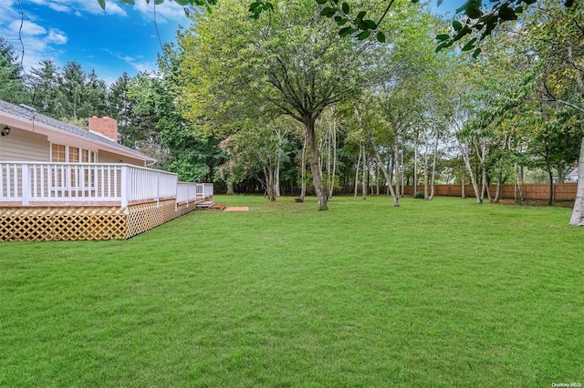 view of yard with a deck