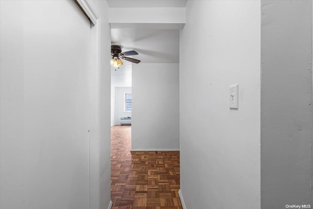 hallway with dark parquet floors