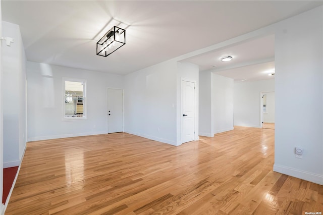 spare room with light wood-type flooring